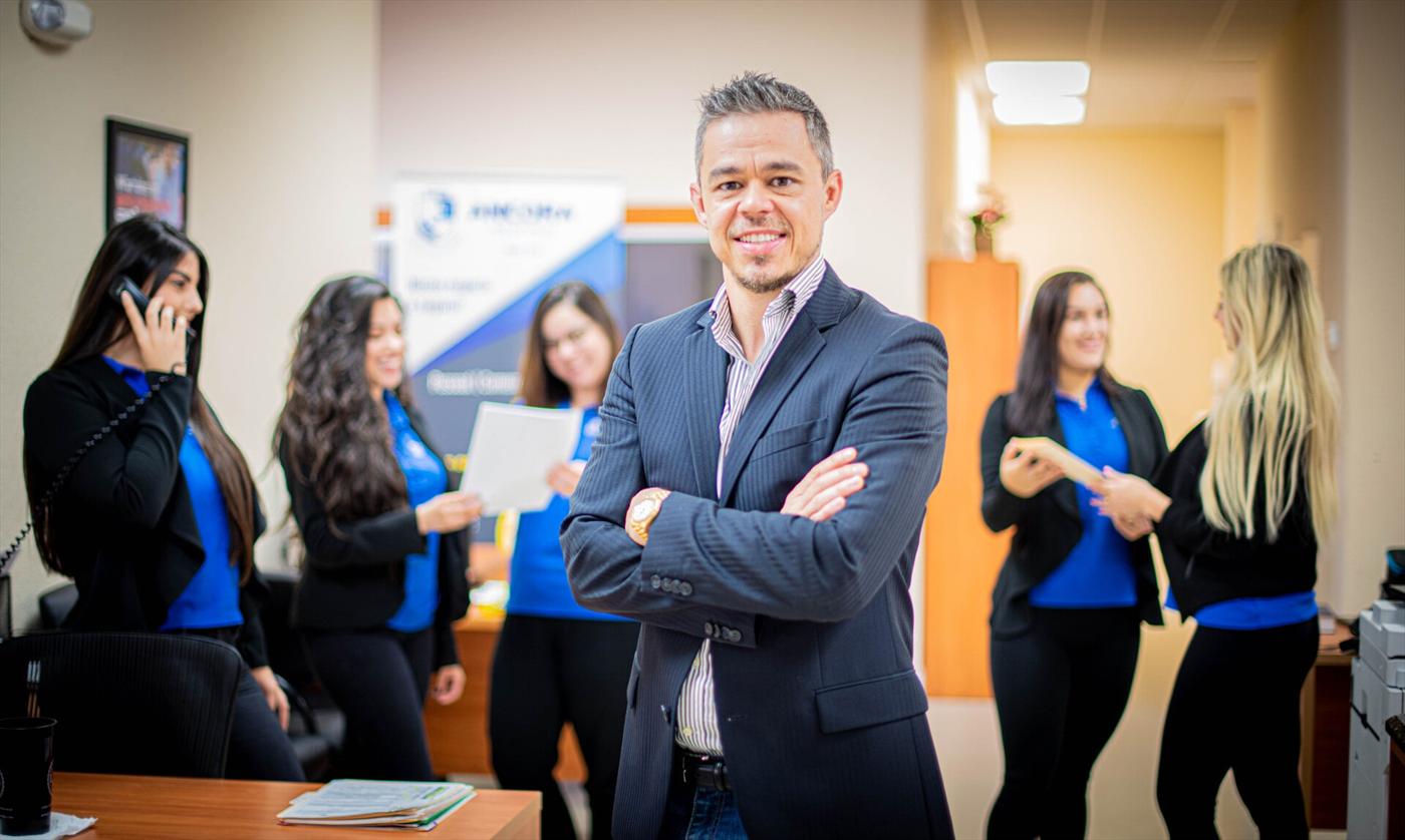 Felipe Costa with the Ancora Insurance team at the Deerfield Beach office